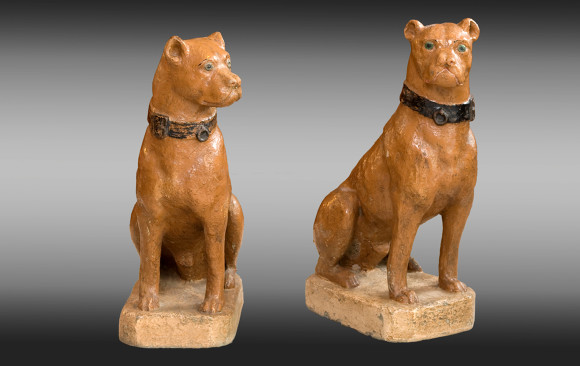 Pair of painted dogs <br/>made in reconstituted stone<br/> Nineteenth Century